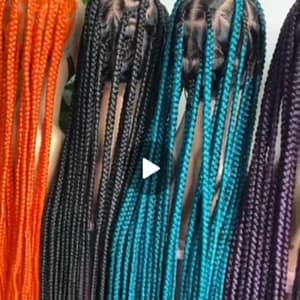 B25, Neatly braided wigs in different colours.